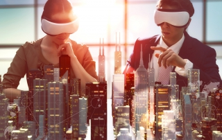 two business persons are developing a project using virtual reality goggles. the concept of technologies of the future